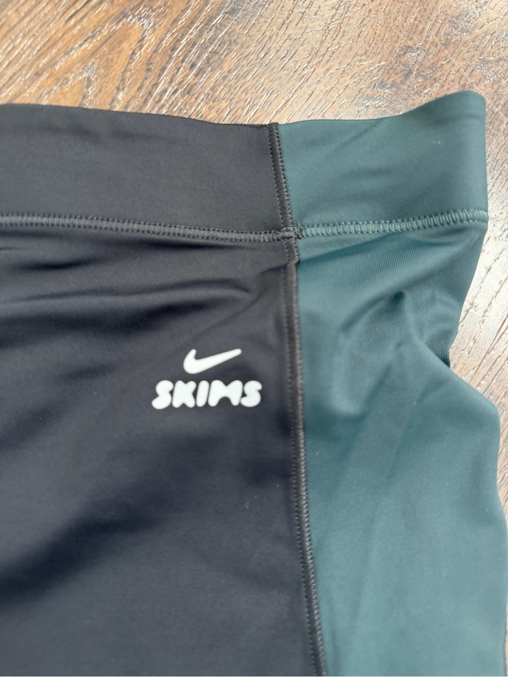 SKIMS Black and Dark Green Athletic Bike Shorts - Picture 2 of 3